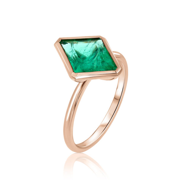 rhombus cut emerald solitaire ring